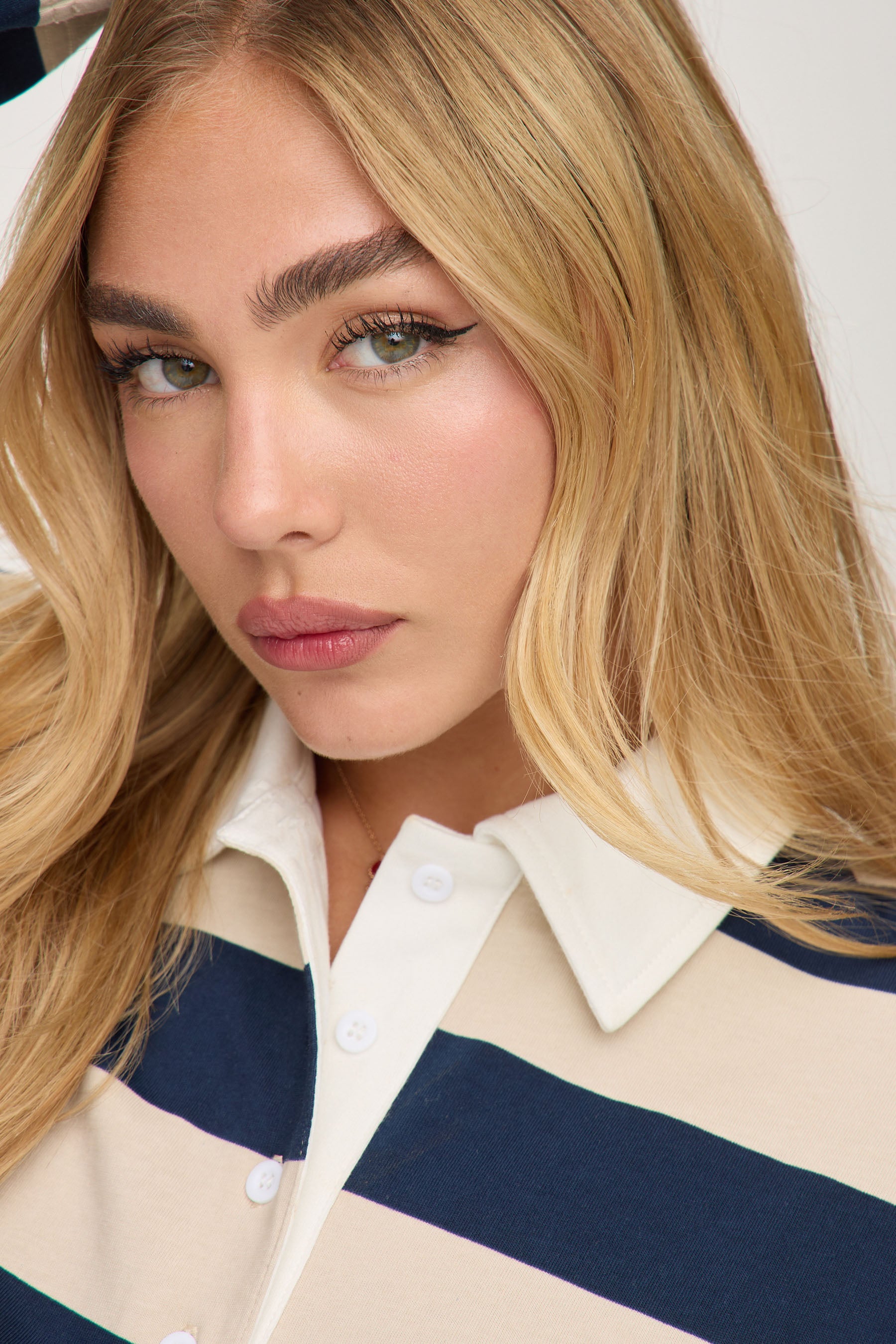 חולצת פולו פסים