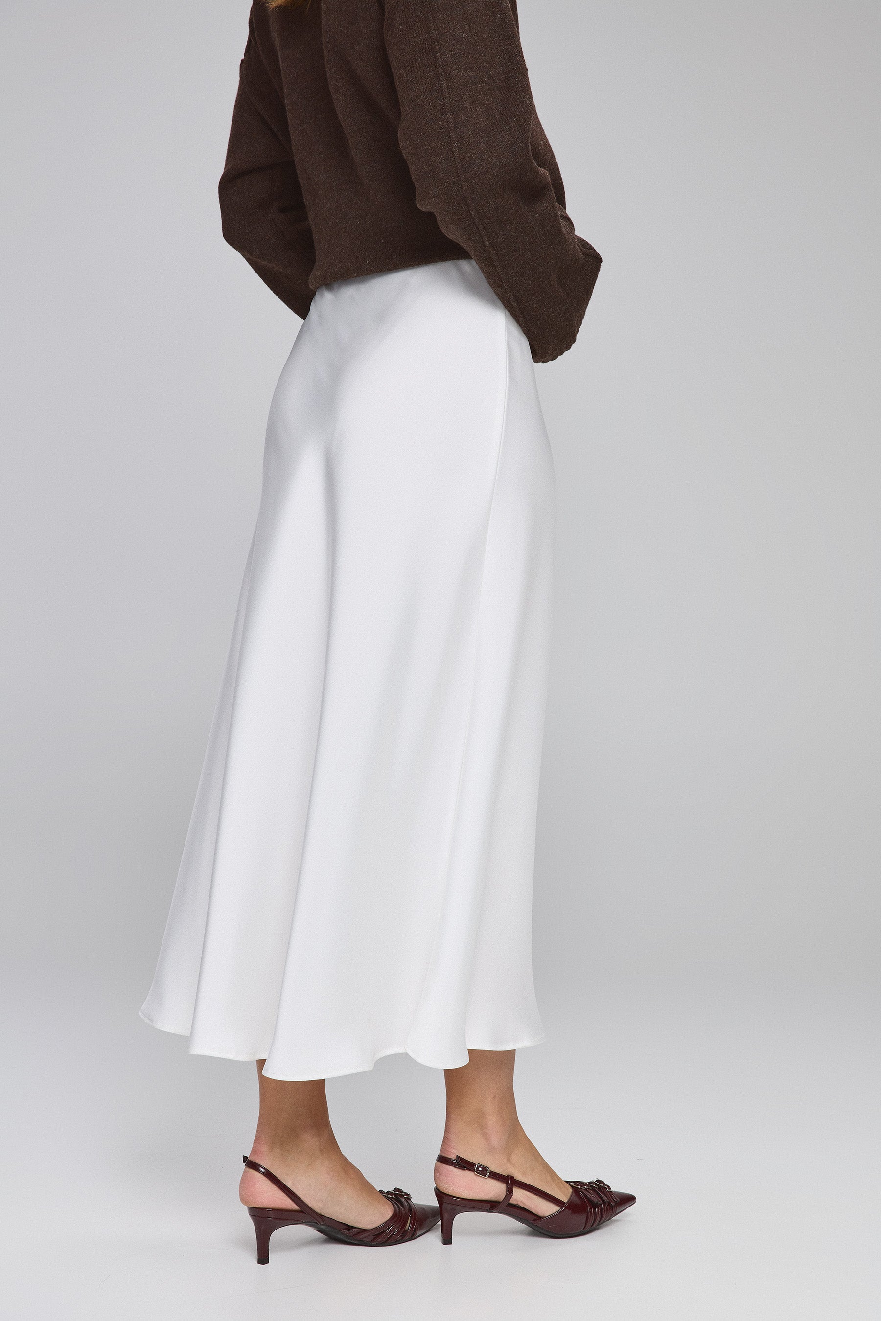 חצאית גלוסי מידי וויט